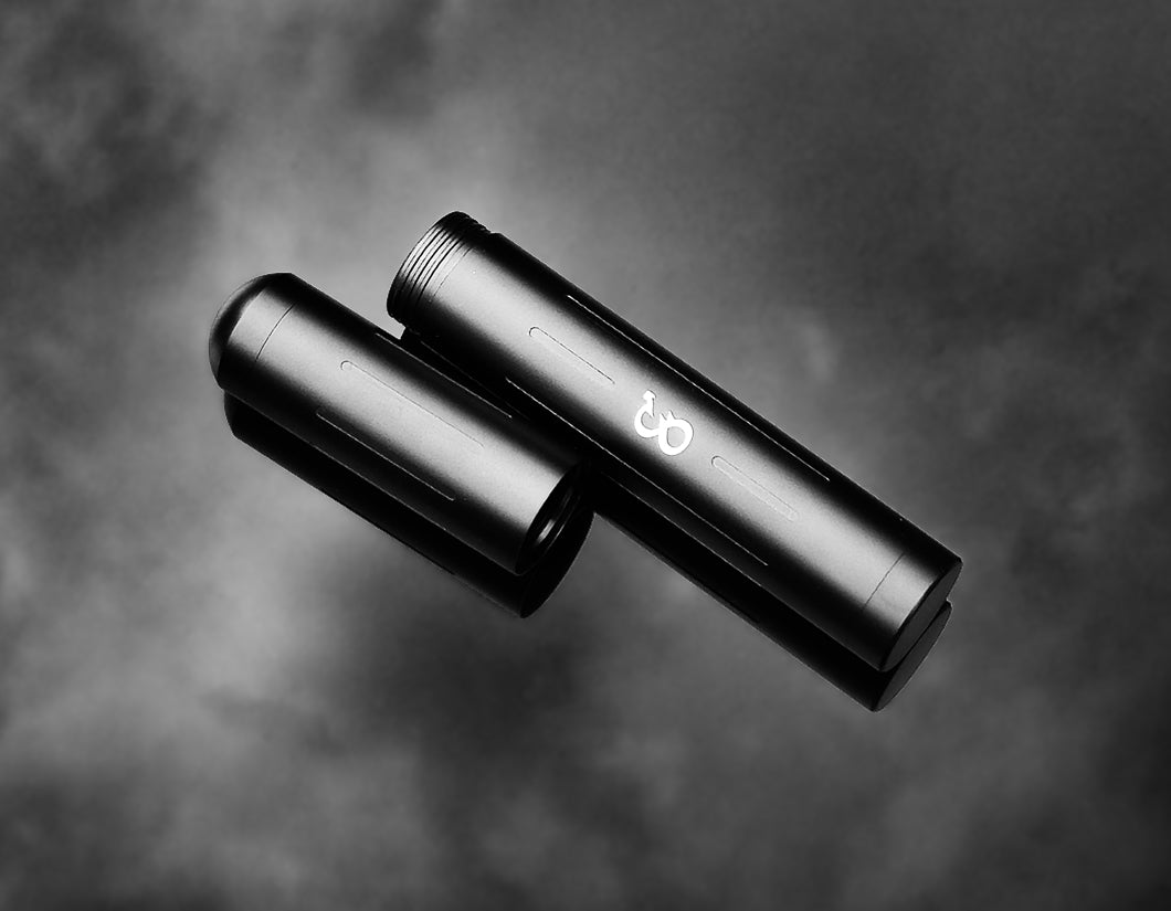 Open aluminium cigar tube case in matte black showing threaded cap.