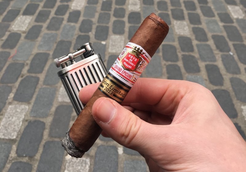 Sisuman Lighter and Hoyo de Monterrey Cigar